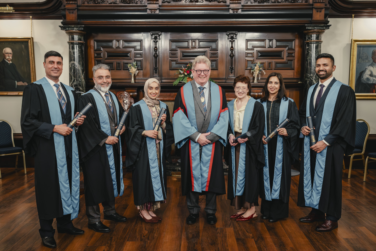 Travel medicine diplomates alongside the dean